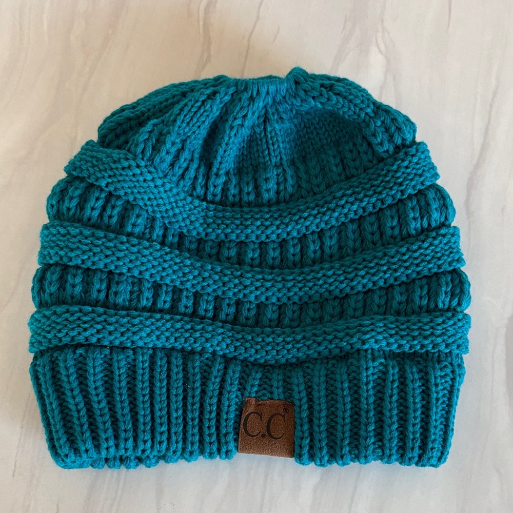 C.C Cable Knit Beanie in Teal Blue with ponytail hole
